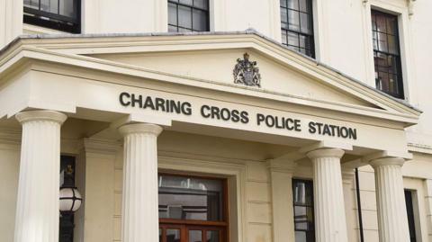 An outside image showing the facade of Charing Cross police station.