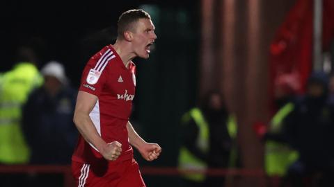 Ethan Hamilton celebrates scoring Accrington's equaliser against Oxford