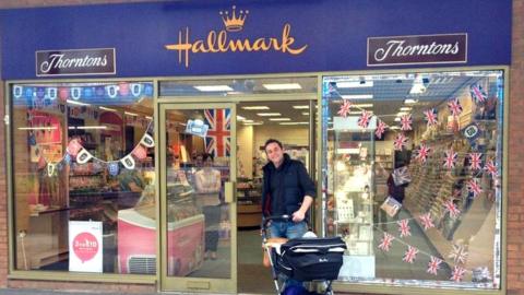 Mark and his son Henry in a pram