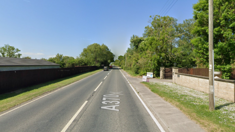 A Google image street view of the A370 with a van driving on the left hand side