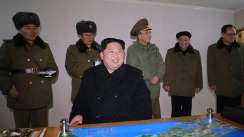 North Korean leader Kim Jong-un (centre) orders the test-firing of a missile, 29 November 2017