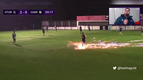 Footballer Matas Skrna is hit by a firework