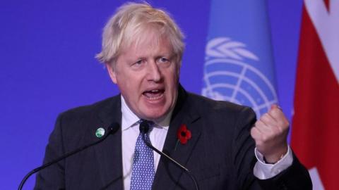 Britain"s Prime Minister Boris Johnson delivers a speech during the opening ceremony of the UN Climate Change Conference (COP26) in Glasgow, Scotland, Britain