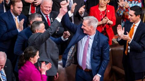 Republican Leader Kevin McCarthy gestures after lawmakers voted him to be the Speaker