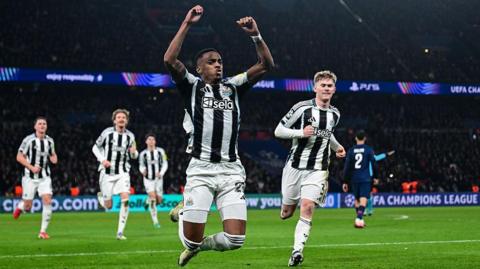 Joe Willock celebrates after scoring for Newcastle United against Paris St-Germain at the Parc des Princes on 29 January, 2026