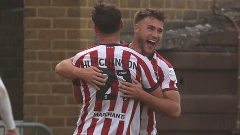 Footballer Sam Sherring celebrates scoring a goal for Cheltenham Town Football Club in EFL League Two at Gillingham