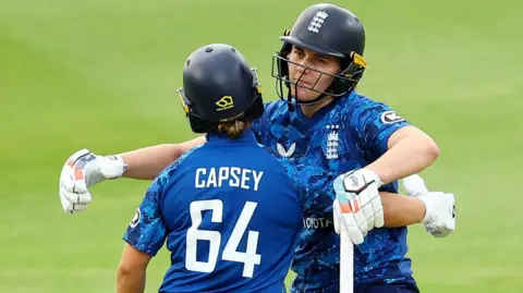 Nat Sciver-Brunt and Alice Capsey celebrate England's win over West Indies