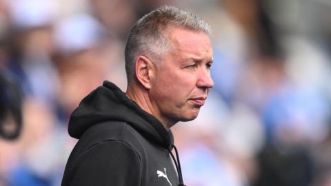 Peterborough United boss Darren Ferguson in the dugout