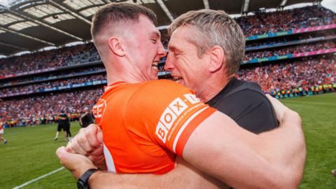 Kieran McGeeney embraces Armagh forward Oisin Conaty after Sunday's final whistle at Croke Park