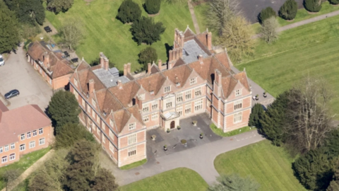 A bird's eye view of Shaw House from the air.