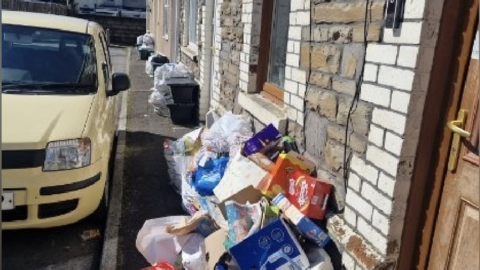 recycling left outside homes on the street