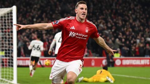 Chris Wood celebrates his goal against Liverpool.