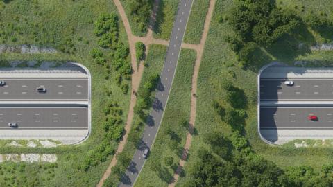 New images of the proposed Lower Thames Crossing released by the Lower Thames Crossing Project. An aerial view shows cars driving either side of a tunnel with a single lane road on top of the tunnel, with green grass and trees on top.