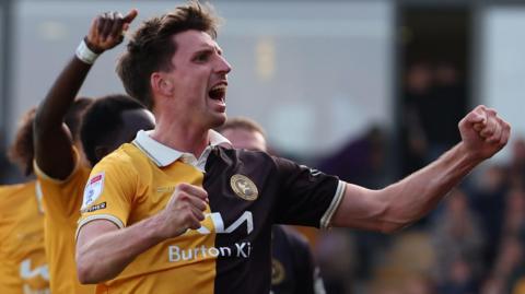 Jake Beesley celebrates a Burton goal