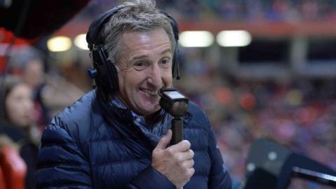 Jonathan Davies with a microphone