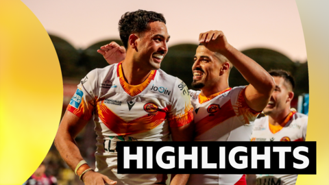 Reimis Smith celebrates scoring a try against Castleford