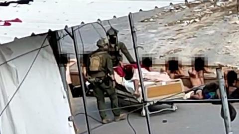 Grabbed of blobbed footage from Nasser Hospital raid