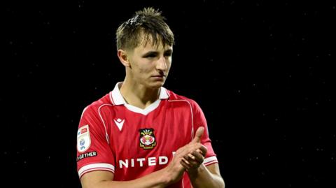 Defender Max Cleworth applauds fans