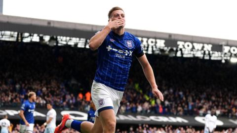 Liam Delap celebrates in an Ipswich shirt