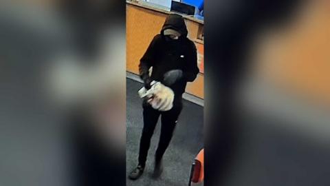 Robber inside Betfred, Harrogate