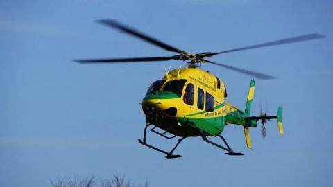 A Wiltshire Air Ambulance helicopter in air