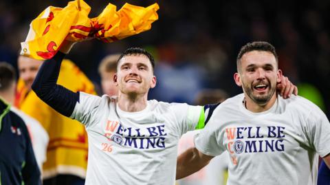 Andy Robertson and John McGinn celebrate