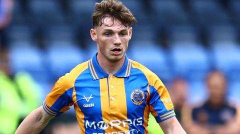 Tommi O'Reilly in action for Shrewsbury Town.