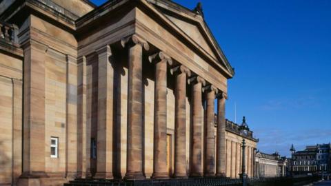 A general view of the National Gallery of Scotland in Edinburgh. It features large stone columns at the front entrance.