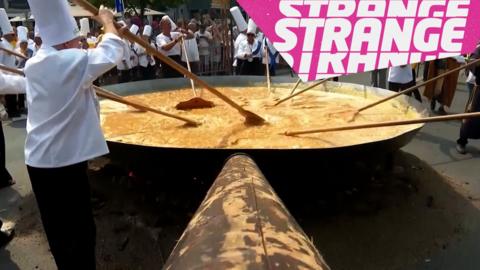 Chefs making a huge omelette