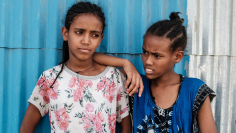 Girls displaced by violence in Ethiopia's Tigray region wait for aid in Mekelle - June 2021