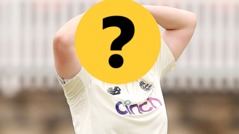 A photo of a former England bowler with her face hidden