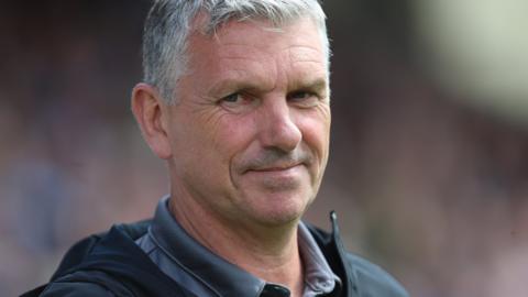 Hartlepool United manager John Askey in the dugout