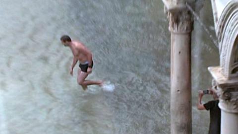 Man walking in flood water