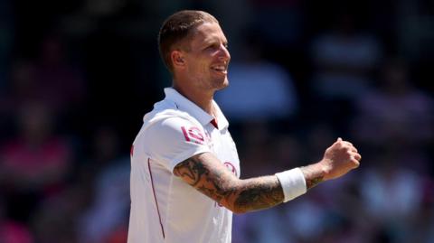 Brydon Carse celebrates a wicket