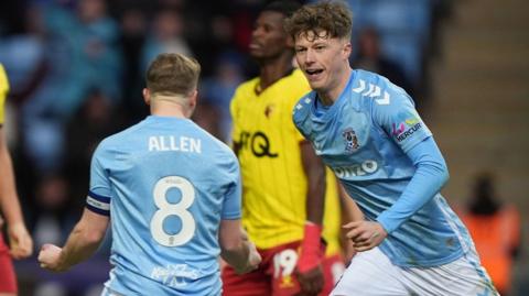 Victor Torp runs to celebrate with Coventry team-mate Jamie Allen