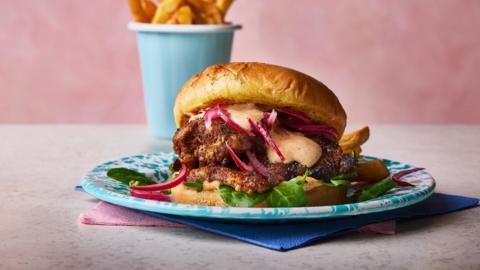 Garlic churrasco chicken burgers with a cup of fries