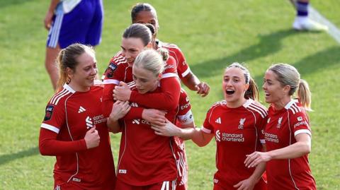 Grace Fisk celebrates with Liverpool team-mates