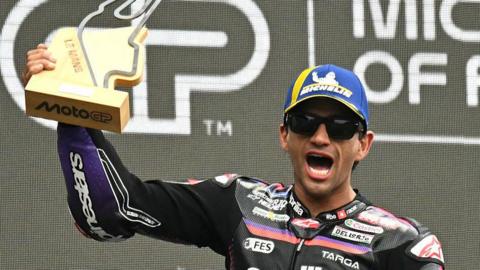 Aprilia Racing's Spanish rider Jorge Martin celebrates on the podium after winning MotoGP's French Grand Prix in May 2026