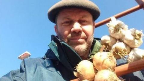 Patrick with his beret and onions