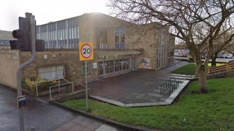 A large 1960s building which housed a now closed swimming pool