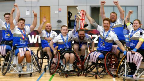 Leeds wheelchair rugby league club celebrate with the Challenge Cup