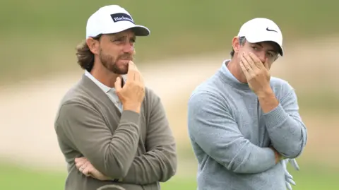 Tommy Fleetwood and Rory McIlroy