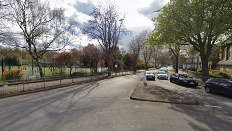 Google Streetview image looking down Gregory Boulevard in Hyson Green with recreation area visible on the left-side of the photo