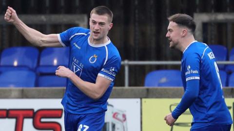 Sean McAllister celebrates scoring