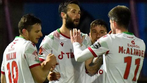 Wrexham players celebrate a goal