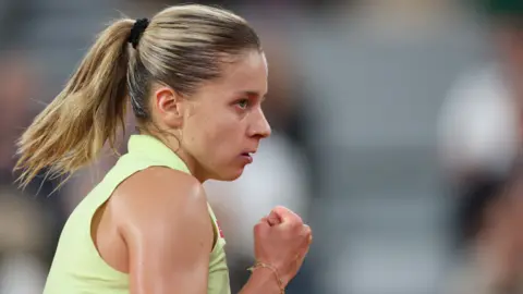 Mirra Andreeva celebrates
