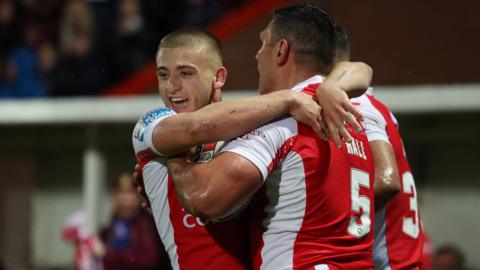 Mikey Lewis and Ryan Hall celebrate a try for Hull KR