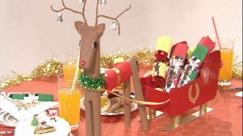 Reindeer decoration on a red table