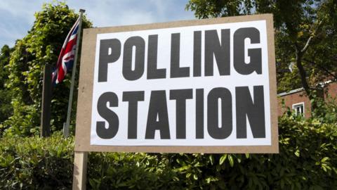 A polling station sign