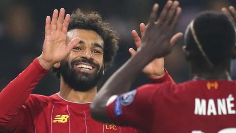 Mo Salah and Sadio Mane high five in Uefa match
